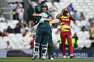 Australia's Beth Mooney (L) and Australia's Ashleigh Gardner (C-facing) embrace as they celebrate the team's victory in the ICC Women's T20 cricket world cup 2026 semi-final game between Australia and West Indies, at The Oval in London on June 30, 2026.
