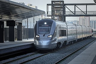 A photograph shows an Etihad Rail train, the UAE's first passenger train, on its inaugural journey at Mohamed bin Zayed City station in Abu Dhabi on June 30, 2026. (Picture used for illustrative purposes).