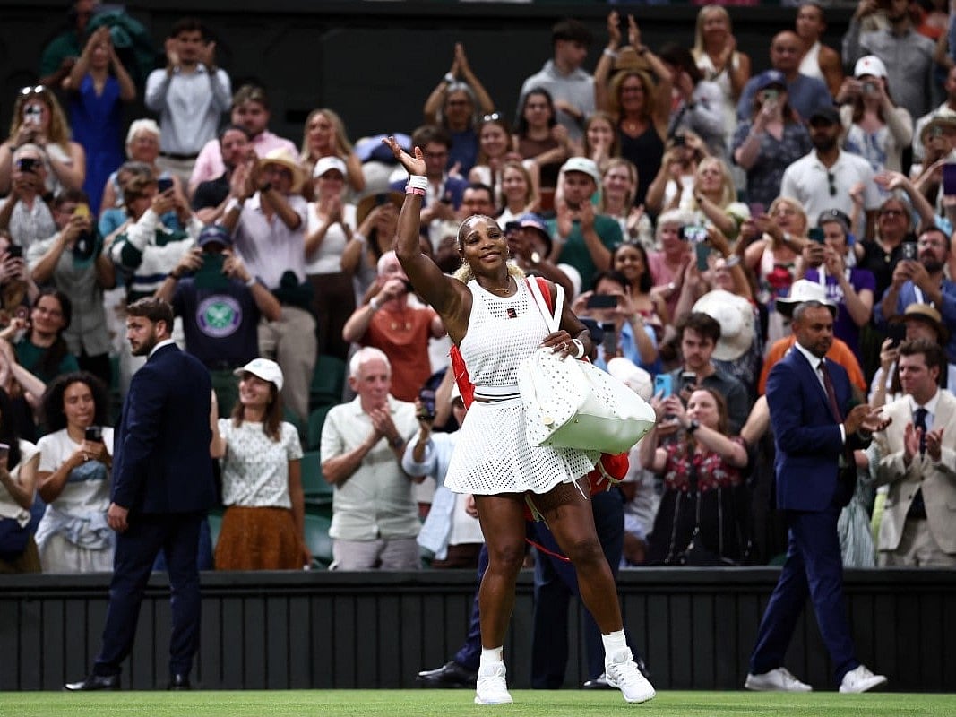 Serena Williams waves as he leaves the court after being defeated by Australia's Maya Joint during their women's singles first round tennis match on the second day of the 2026 Wimbledon Championships in London on June 30, 2026.