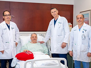Dr Mohi Mitiek, Head of Cardiac and Thoracic Surgery at American Hospital Dubai, and his team with the patient