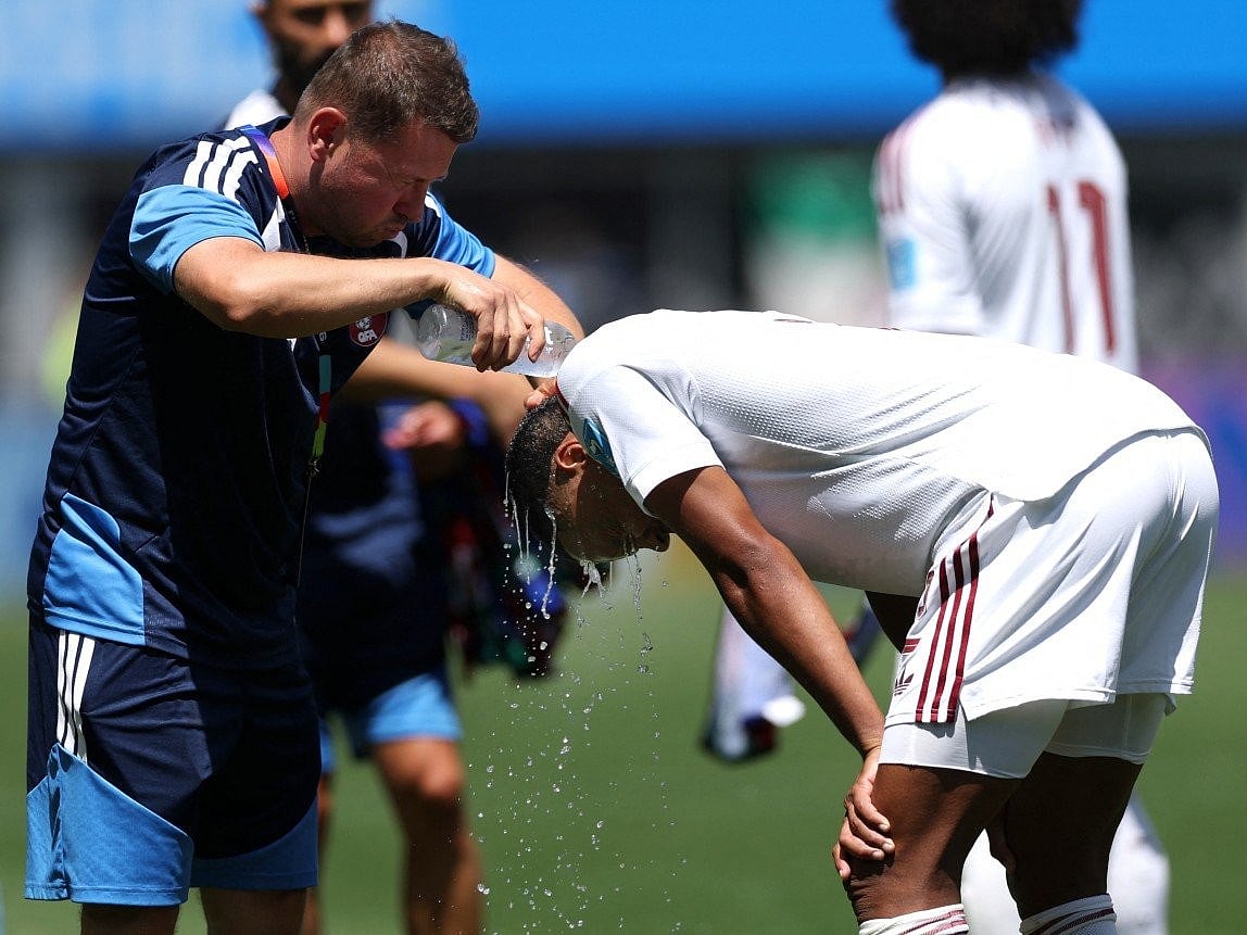 Miguel Pedro of Qatar is cooled down with water during the hydration break during the FIFA World Cup 2026 Group B match between Bosnia and Herzegovina and Qatar at Seattle Stadium on June 24, 2026 in Seattle, Washington.