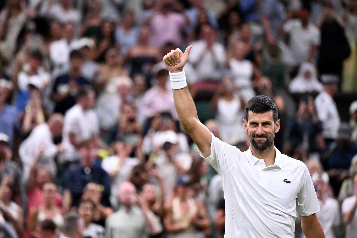 Serbia's Novak Djokovic celebrates beating Greece's Stefanos Tsitsipas during their men's singles second round tennis match on the third day of the 2026 Wimbledon Championships at The All England Lawn Tennis and Croquet Club in Wimbledon, southwest London, on July 1, 2026.