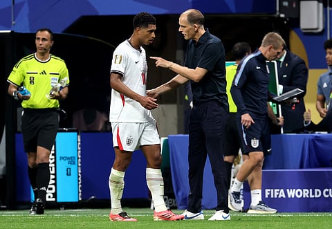 Thomas Tuchel, Manager of England, speaks to Jude Bellingham #10 at the hydration break during the FIFA World Cup 2026 Round Of 32 match between England and Congo DR at Atlanta Stadium on July 01, 2026 in Atlanta, Georgia.