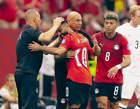 Mohamed Salah #10 and Emam Ashour #8 of Egypt celebrate with coaches as they are substituted during the FIFA World Cup 2026 Group G match between New Zealand and Egypt at BC Place Vancouver on June 21, 2026 in Vancouver, British Columbia.