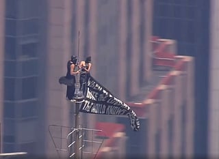 Mad love: The pair, as shown by NYPD bodycam shared with US media, dressed in black and wearing face coverings, scaled the building's antenna — about 1,454 feet (443 metres) above Midtown Manhattan — without visible safety equipment. They were later identified as Russian-born urban explorers Angela Nikolau and Ivan Kuznetsov (also known publicly as Vanya Beerkus). They were taken into custody after descending and face charges including burglary.
