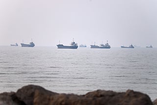 Commercial vessels are seen in the Strait of Hormuz off Bandar Abbas, Iran.