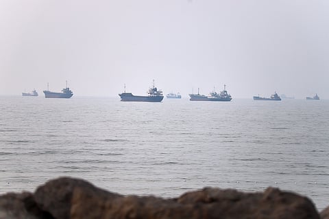 Commercial vessels are seen in the Strait of Hormuz off Bandar Abbas, Iran.