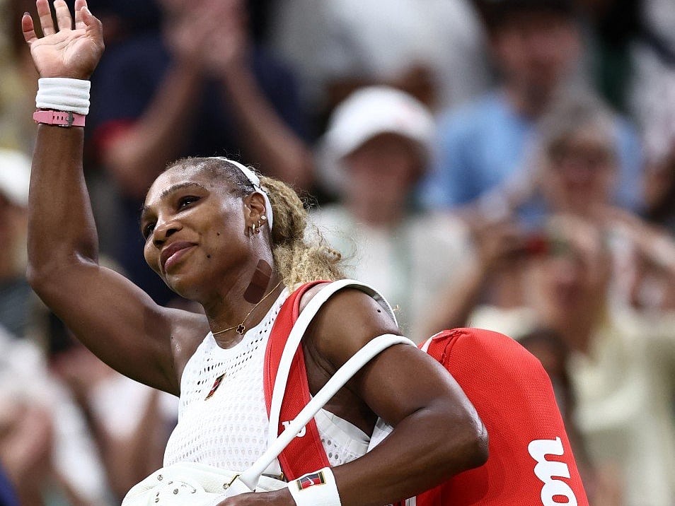 US player Serena Williams waves as he leaves the court after being defeated by Australia's Maya Joint during their women's singles first round tennis match on the second day of the 2026 Wimbledon Championships at The All England Lawn Tennis and Croquet Club in Wimbledon, southwest London, on June 30, 2026.