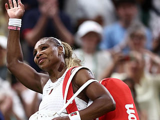 US player Serena Williams waves as he leaves the court after being defeated by Australia's Maya Joint during their women's singles first round tennis match on the second day of the 2026 Wimbledon Championships at The All England Lawn Tennis and Croquet Club in Wimbledon, southwest London, on June 30, 2026.