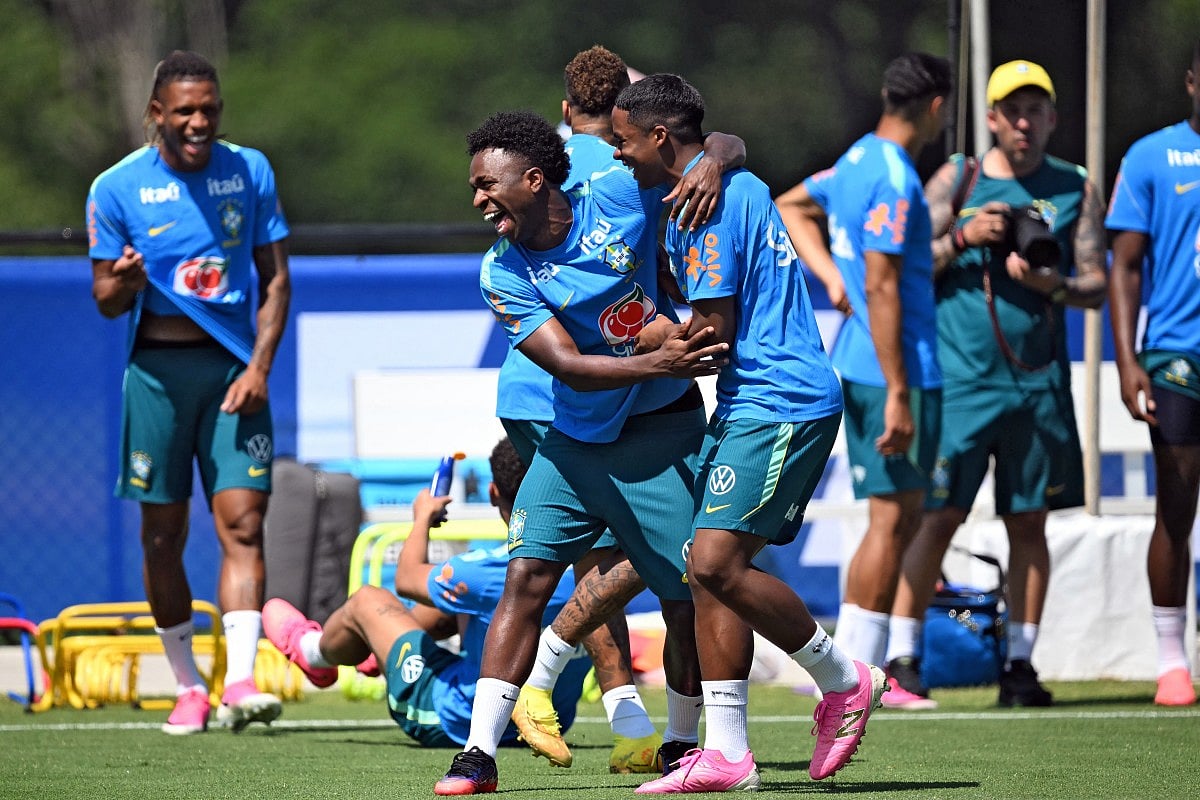Brazil's forward #07 Vinicius Junior (C) shares a laugh with Brazil's forward #19 Endrick (C,R) during a training session at the Columbia Park Training Facility in Morristown, New Jersey on July 2, 2026, during the 2026 World Cup football tournament.
