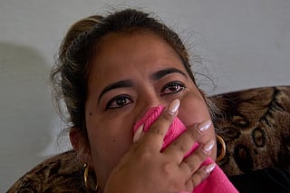 Cancer patient Irisleydis Trista Calzadilla cries during an interview at her home in Batabano, Cuba, Friday, June 26, 2026. (AP Photo/Ramon Espinosa)