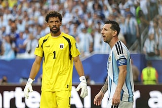 Argentina's forward #10 Lionel Messi gestures alongside Cape Verde's goalkeeper #01 Vozinha during the 2026 World Cup round of 32 football match between Argentina and Cape Verde at the Miami Stadium in Miami Gardens on July 3, 2026.