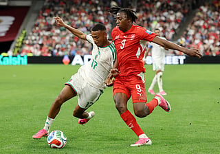 Rafik Belghali #17 of Algeria competes for the ball against Johan Manzambi #9 of Switzerland during the FIFA World Cup 2026 Round of 32 match between Switzerland and Algeria at BC Place Vancouver on July 02, 2026 in Vancouver, British Columbia.