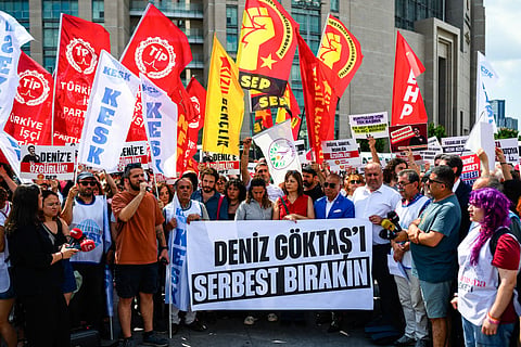 Turkish leftists chant slogans for Turkish comedian Deniz Goktas, who has been detained and brought before the court, holding a banner reading “Deniz Goktas Must Be Freed” in front of Caglayan Courthouse on 03 July, 2026