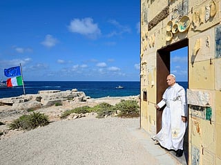Pope Leo XIV walking through the arch of the monument Door of Europe - Porta d'Europa made by the italian artist Mimmo Paladino during a one day visit to Lampedusa island, south of Sicily, on July 4, 2026.