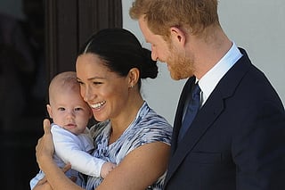 Britain's Duke and Duchess of Sussex, Prince Harry and his wife Meghan hold their baby son Archie, September 25, 2019.