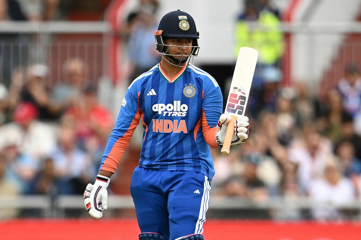 India's Vaibhav Sooryavanshi reacts as he walks back to the pavilion having lost his wicket for 14 runs during the second Twenty20 (T20) international cricket match between England and India at Old Trafford in Manchester, north-east England on July 4, 2026.