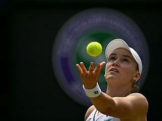 Kazakhstan's Elena Rybakina serves to Belgium's Elise Mertens during their women's singles third round tennis match on the sixth day of the 2026 Wimbledon Championships at The All England Lawn Tennis and Croquet Club in Wimbledon, southwest London, on July 4, 2026.