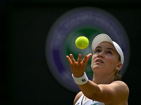 Kazakhstan's Elena Rybakina serves to Belgium's Elise Mertens during their women's singles third round tennis match on the sixth day of the 2026 Wimbledon Championships at The All England Lawn Tennis and Croquet Club in Wimbledon, southwest London, on July 4, 2026.