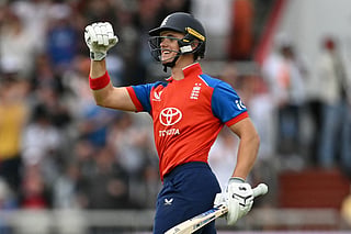 England's Jacob Bethell celebrates as England hit the winning runs during the second Twenty20 (T20) international against India at Old Trafford in Manchester, north-west England on July 4, 2026.