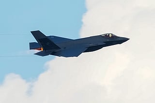 A US Air Force F-35 fighter jet flies overhead during the "Salute to America" Independence Day celebration on the National Mall in Washington, DC, on July 4, 2026.