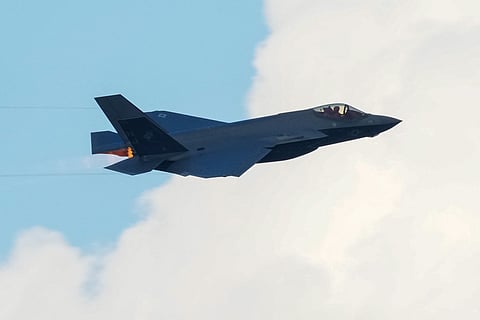 A US Air Force F-35 fighter jet flies overhead during the "Salute to America" Independence Day celebration on the National Mall in Washington, DC, on July 4, 2026.