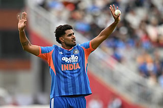 India's Harshit Rana prepares to bowl during the second Twenty20 (T20) international cricket match between England and India at Old Trafford in Manchester, north-west England on July 4, 2026.