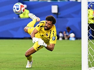 Cape Verde's goalkeeper  Vozinha eyes the ball as he dives during the 2026 World Cup round of 32 football match against Argentina at the Miami Stadium in Miami Gardens on July 3, 2026.