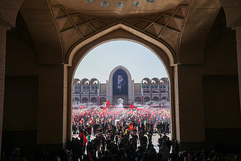 Mourners gather at the Grand Mosalla to pray for Iran's slain supreme leader Ayatollah Ali Khamenei during the second day of funeral ceremonies in Tehran on July 5.