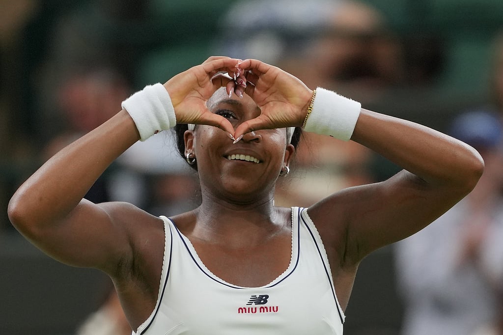 Coco Gauff of the United States reacts after winning against Belinda Bencic of Switzerland in their fourth round women's singles match at the Wimbledon Tennis Championships in London, Sunday, July 5, 2026. (AP Photo/Kin Cheung)