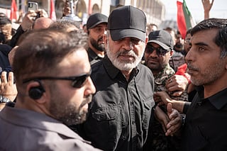 Iran’s Revolutionary Guards chief amid supporters. Tehran’s hardliners believe Iran’s survival through six months of war shows it can continue resisting US pressure rather than compromise.