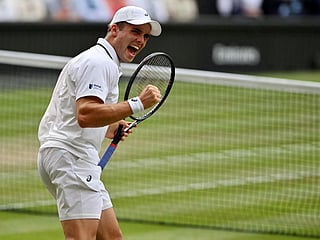 Britain's Arthur Fery reacts as he plays against Bulgaria's Grigor Dimitrov during their men's singles round of 16 tennis match on the eighth day of the 2026 Wimbledon Championships at The All England Lawn Tennis and Croquet Club in Wimbledon, southwest London, on July 6, 2026.