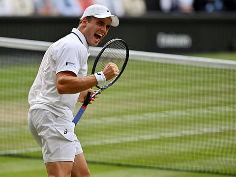 Britain's Arthur Fery reacts as he plays against Bulgaria's Grigor Dimitrov during their men's singles round of 16 tennis match on the eighth day of the 2026 Wimbledon Championships at The All England Lawn Tennis and Croquet Club in Wimbledon, southwest London, on July 6, 2026.