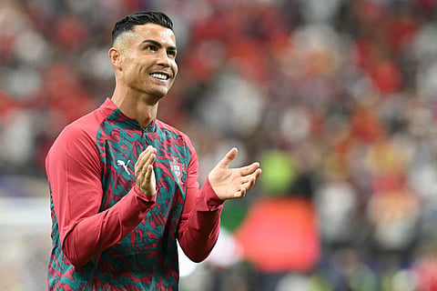 Portugal's forward #07 Cristiano Ronaldo acknowledges the crowd ahead of the 2026 World Cup round of 16 football match between Portugal and Spain at the Dallas Stadium in Arlington on July 6, 2026.