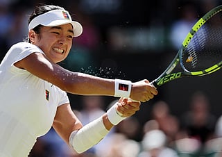 Philippines' Alexandra Eala returns to Italy's Jasmine Paolini during their women's singles round of 16 tennis match on the eighth day of the 2026 Wimbledon Championships at The All England Lawn Tennis and Croquet Club in Wimbledon, southwest London, on July 6, 2026.