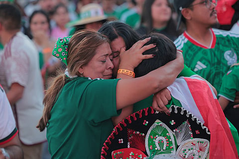 Mexico fans react after their team lost the 2026 World Cup round of 16 football match between the Mexico and England, at a watch party at Ace Mission Studios, in Los Angeles, California, on July 5, 2026.