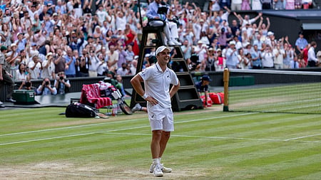 Fery stuns Dimitrov to make Wimbledon QF
