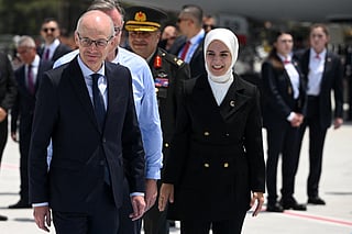 Belgium's Prime Minister Bart De Wever is welcomed by Turkey's Minister of Family and Social Services Mahinur Ozdemir Goktas upon arrival at Esenboga Airport to attend the 36th NATO Heads of State and Government Summit in Ankara on July 7, 2026.