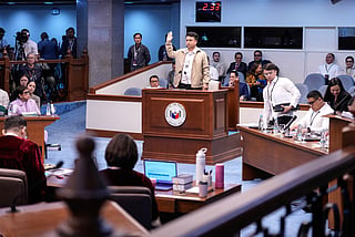 National Bureau of Investigation senior agent John Mark Calilung (C) takes the oath as a witness during the impeachment trial of Philippine Vice President Sara Duterte at the Senate of the Philippines in Pasay, Metro Manila on July 7, 2026.