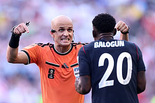 Folarin Balogun #20 of the United States argues with referee Adham Makhadmeh during the FIFA World Cup 2026 Round of 16 match between USA and Belgium at Seattle Stadium on July 06, 2026 in Seattle, Washington.