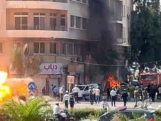 Explosive devices blow up near a hotel where French President Emmanuel Macron was meant to be staying, in Damascus.  