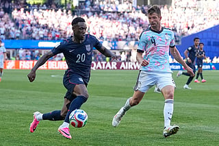 United States' Folarin Balogun (20) and Belgium's Brandon Mechele (4) battle for the ball during the World Cup round of 16 soccer match between the United States and Belgium in Seattle, Monday, July 6, 2026. 