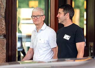 Tim Cook (L), CEO of Apple, walks with John Ternus, incoming CEO of Apple, at the Allen & Company Sun Valley Conference at the Sun Valley Lodge on July 7, 2026 in Sun Valley, Idaho.