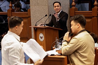 Prosecution counsel Amando Ligutan (C) reacts as defence counsel Carlo Narvasa (L) questions witness John Mark Calilung (R), a National Bureau of Investigation senior agent, during proceedings of the impeachment trial of Philippine Vice-President Sara Duterte (not pictured), at the Philippine Senate in Pasay City, Metro Manila on July 8, 2026.