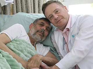 NMC's palliative care consultant Dr Paul Coulter with Mohammed Mazhar Siddique
