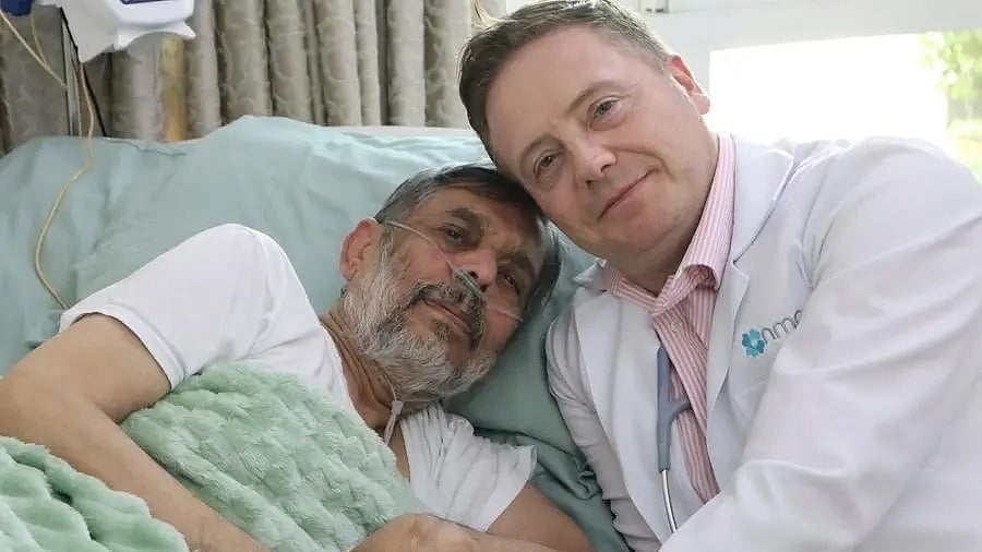 NMC's palliative care consultant Dr Paul Coulter with Mohammed Mazhar Siddique