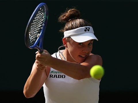 Czech Republic's Linda Noskova returns to Ukraine's Marta Kostyuk during their women's singles semi-final tennis match on the eleventh day of the 2026 Wimbledon Championships at The All England Lawn Tennis and Croquet Club in Wimbledon, southwest London, on July 9, 2026.