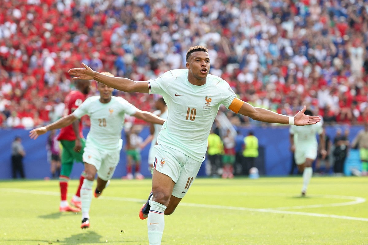 France's forward #10 Kylian Mbappe celebrates scoring his team's first goal during the 2026 World Cup football tournament quarter-final match between France and Morocco at Boston Stadium in Foxborough on July 9, 2026.