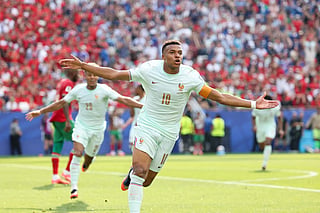 France's forward #10 Kylian Mbappe celebrates scoring his team's first goal during the 2026 World Cup football tournament quarter-final match between France and Morocco at Boston Stadium in Foxborough on July 9, 2026.