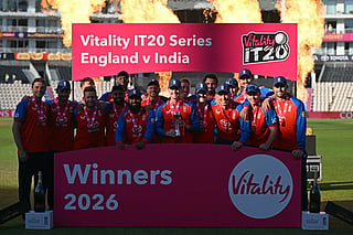 Man of the Series England's Harry Brook holds the trophy as England players celebrate their Series win after the fifth Twenty20 (T20) International match against India at Utilita Bowl in Southampton on July 11, 2026.